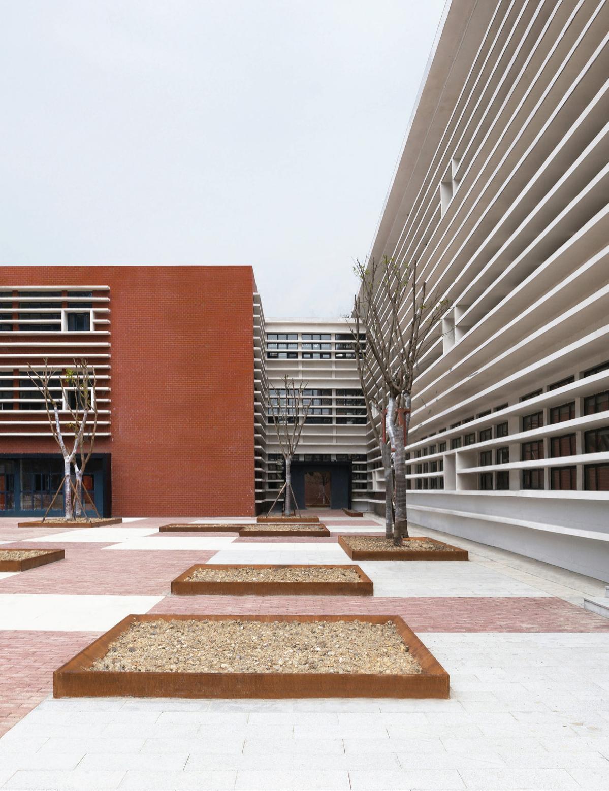 Paving and facade detail within a courtyard.