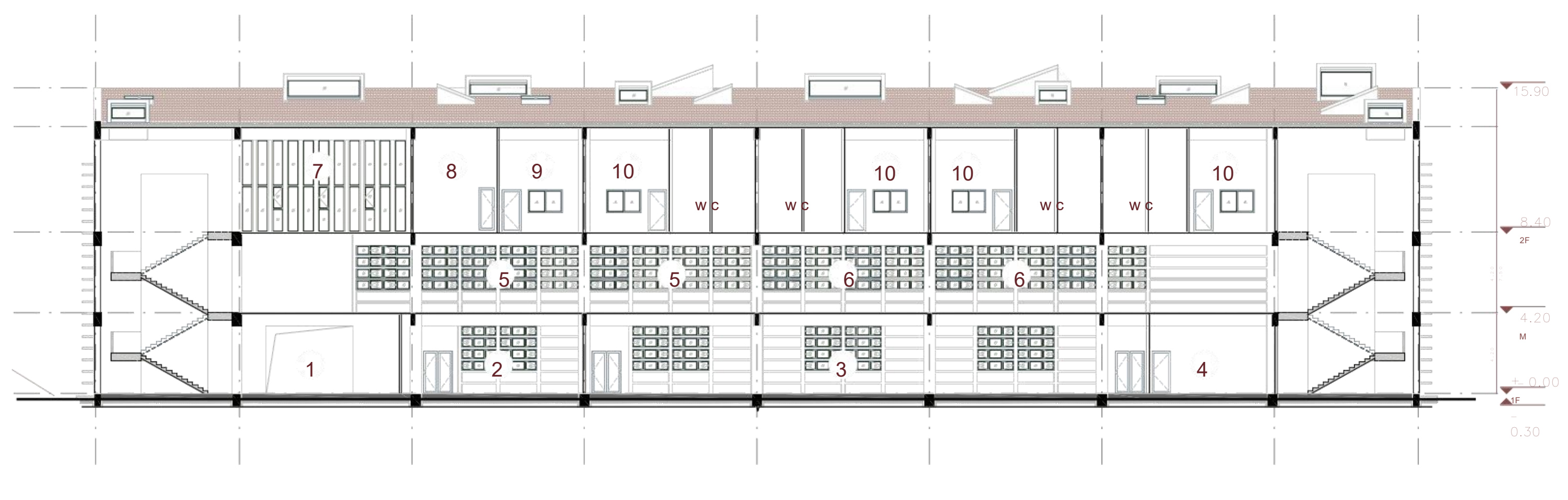 Longitudinal section through the fire station, showing the garage, mezzanine, living floor and skylights.