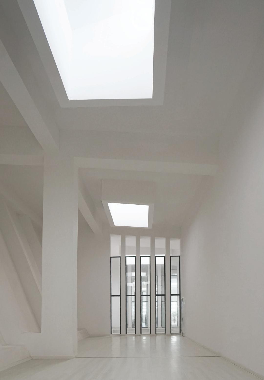 Library area beneath the skylights.